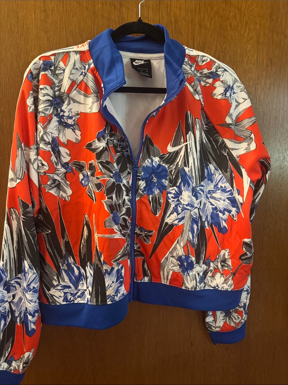 Nike Women's Red Floral Bomber Jacket with Blue Trim